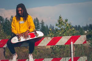 Man wearing a yellow sweater