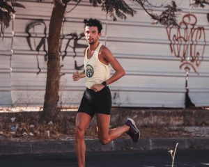 Slim man running (ectomorph)