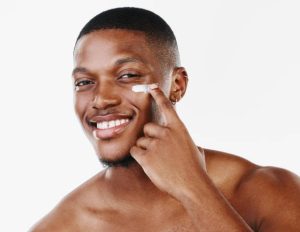 Man using sunscreen