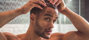 Man caring for his scalp