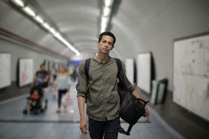 Man dressed comfortably for a trip