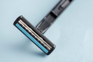Shaving stick with sharp blade 