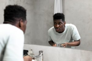 Man looking in the mirror 