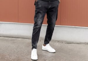 Man wearing dark grey jeans 