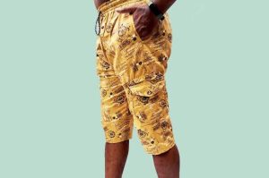 Man wearing yellow three quarter pants 