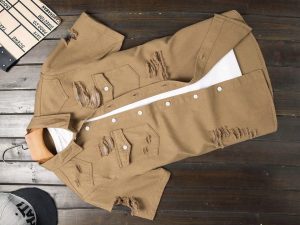 A shirt with ripped design 