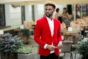 Man dressed in red suit