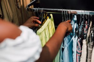 Man choosing shorts