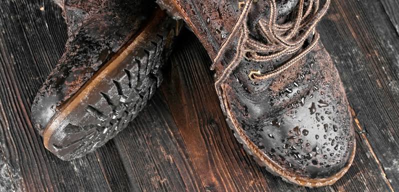A soaked pair of leather boots